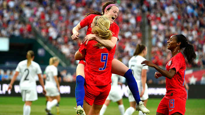Rose Lavelle, Lindsey Horan and Crystal Dunn celebrate a USWNT goal